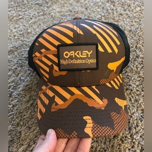 Oakley orange and black SnapBack hat